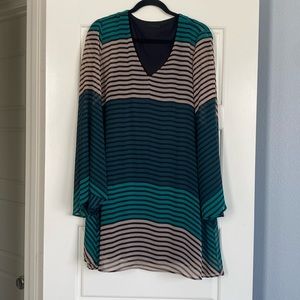 Green, tan, and stripped long sleeve dress.